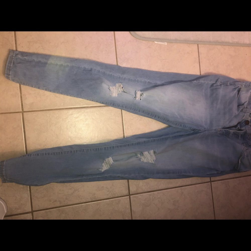 distressed light wash skinny jeans